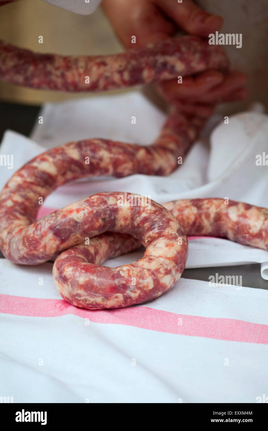 Making pork sausage in a butcher shop Stock Photo Alamy