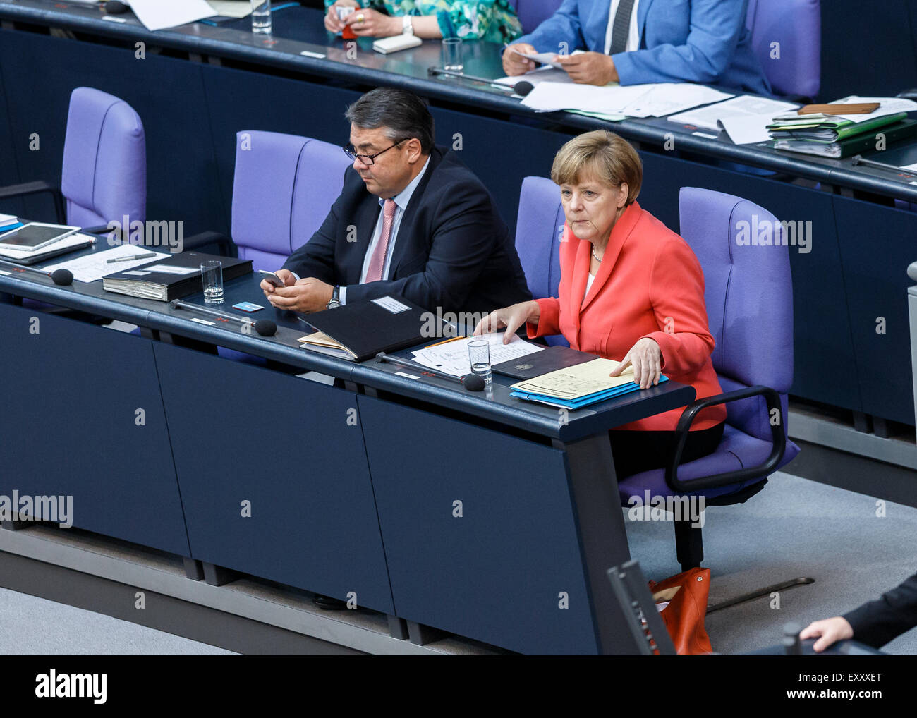 Berlin, Germany. 17th July, 2015. Special session of the German Parliament - consultation of government on the ' negotiations of the Government Federal relative to the concession of financial support for the Hellenic Republic of Greece ' realized at the German Parliament on 17.07.2015 in Berlin, Germany./Picture: Chancellor Angela Merkel (CDU), and Sigmar Gabriel (SPD), German Minister of Economy and Energy, during the session of the german Parliament relative to the concession of financial support for the Hellenic Republic of Greece. Credit:  Reynaldo Chaib Paganelli/Alamy Live News Stock Photo