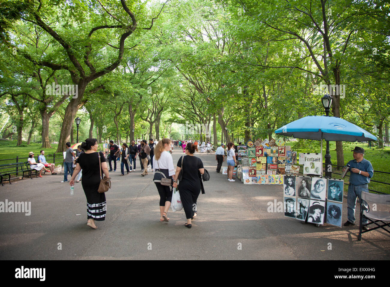 NEW YORK - May 25, 2015: People walking in Literary Walk, in Central Park, New York City. Central Park is an urban park in the c Stock Photo