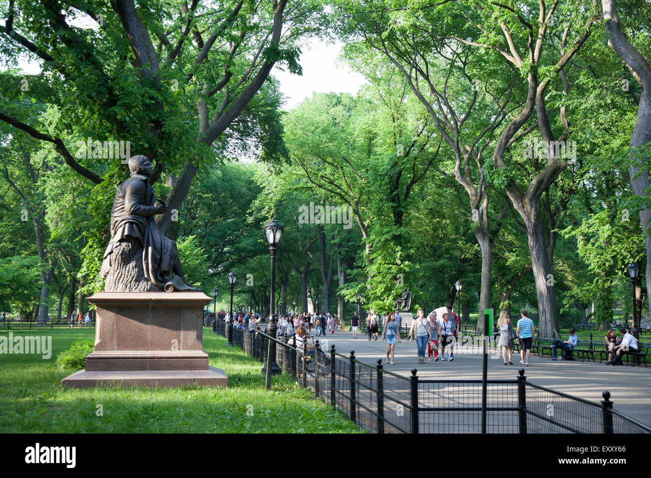 NEW YORK - May 25, 2015: People walking in Literary Walk, in Central Park, New York City. Central Park is an urban park in the c Stock Photo