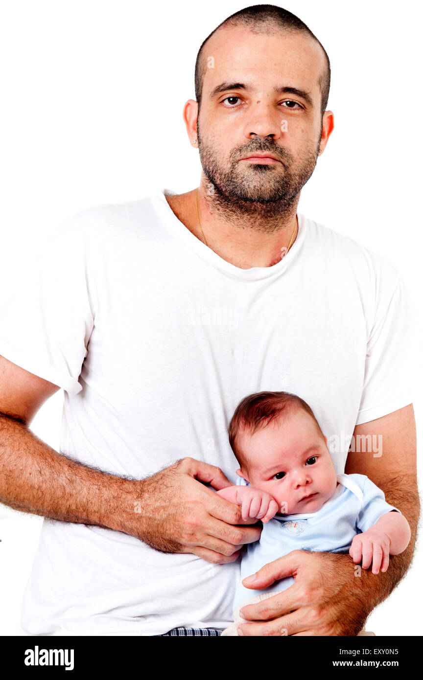Middle age man holding a newborn baby. Stock Photo