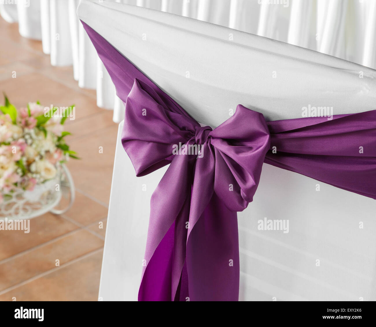 Lilac ribbon bow isolated on white background Stock Photo by FabrikaPhoto