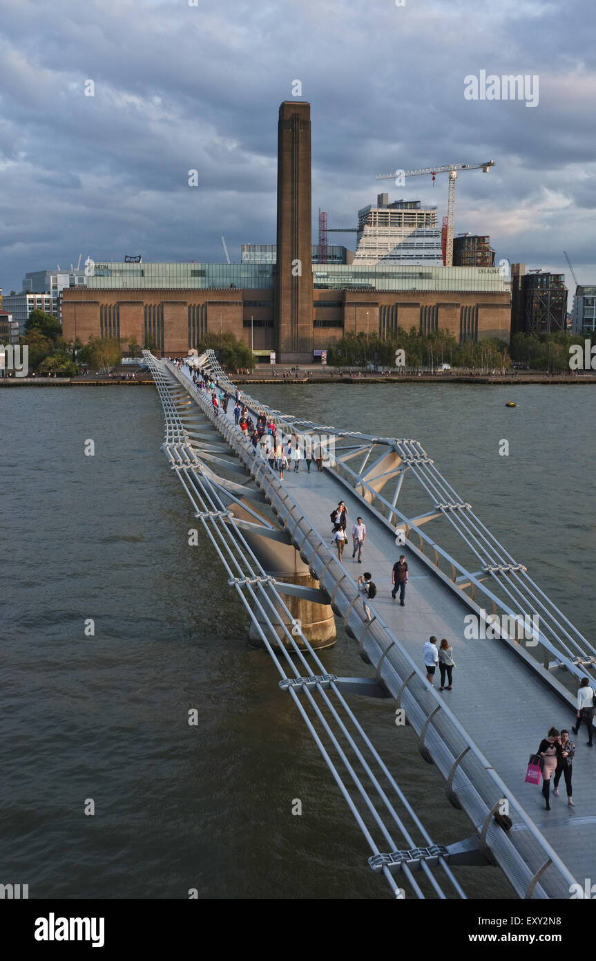 The Millennium Bridge over the River Thames leading to the Tate Modern in London in the background Stock Photo