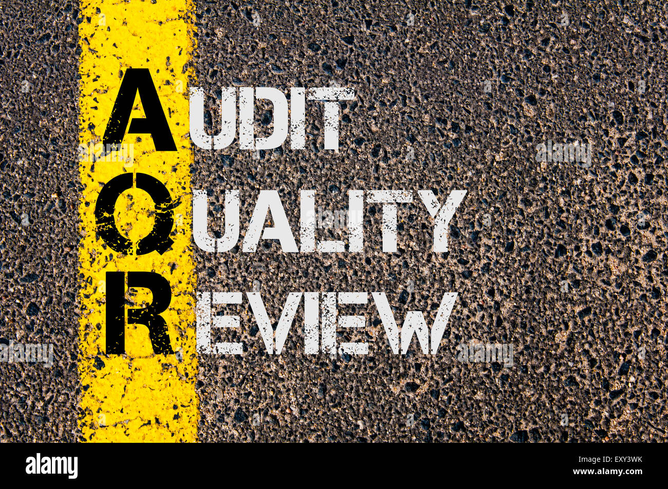 Concept image of Business Acronym AQR as Audit Quality Review written over  road marking yellow paint line Stock Photo - Alamy