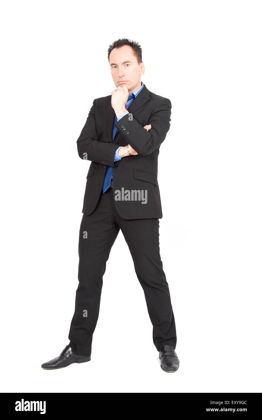 Handsome businessman doing different expressions in different sets of clothes: arms crossed Stock Photo