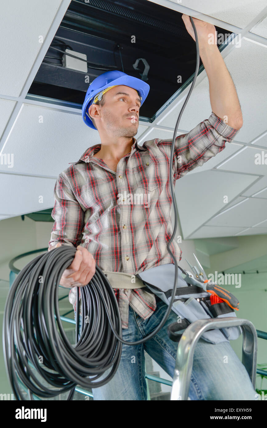 Electrician High Rises Electrician climb work installing hi-res stock photography and images ...