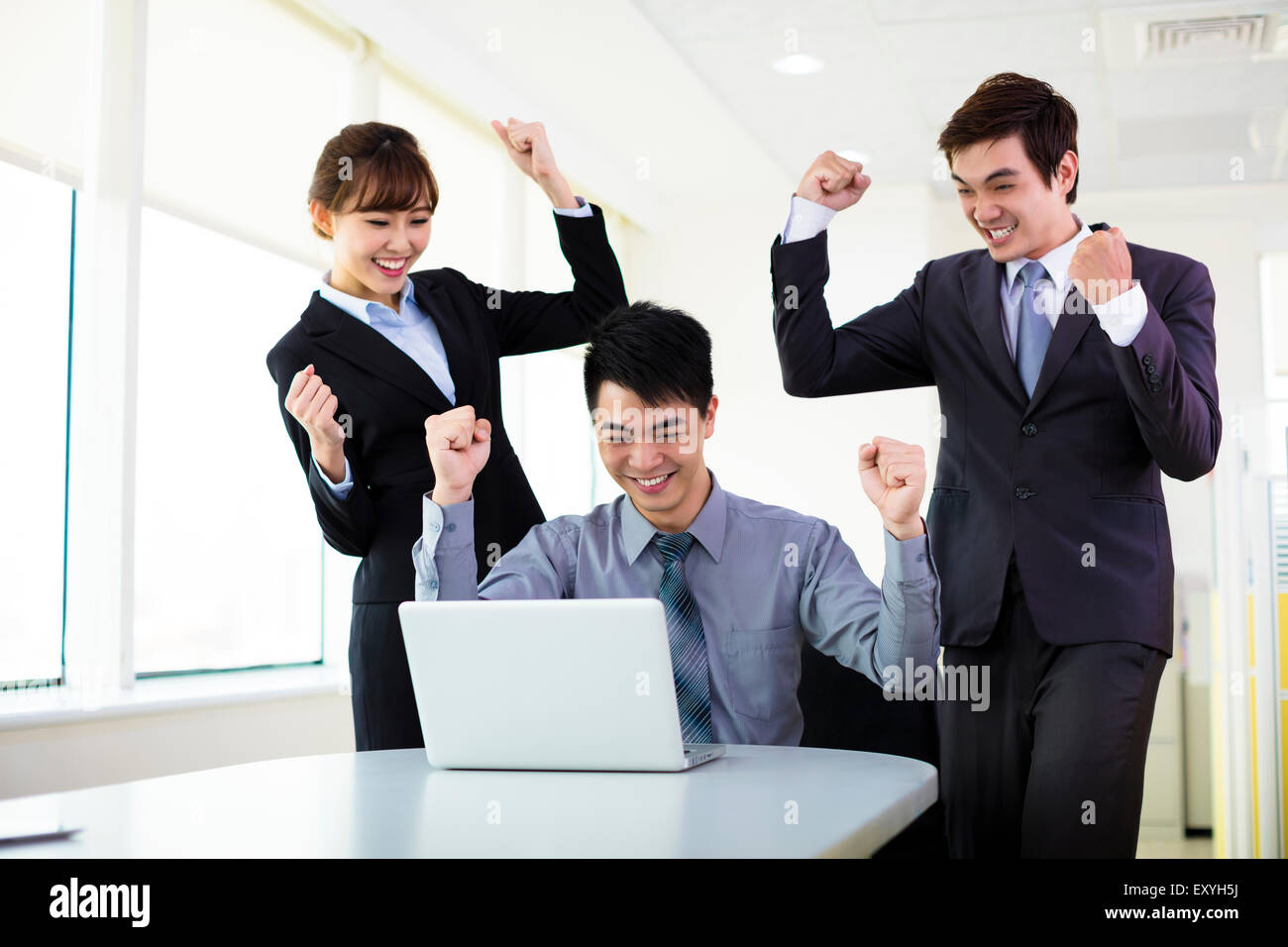 successful Young business people working in the office Stock Photo - Alamy