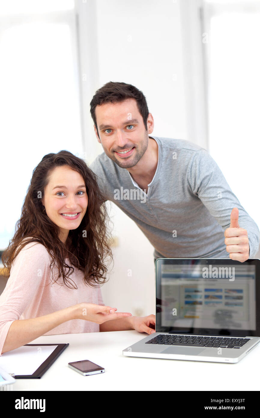 View of Coworkers showing their finished work Stock Photo Alamy