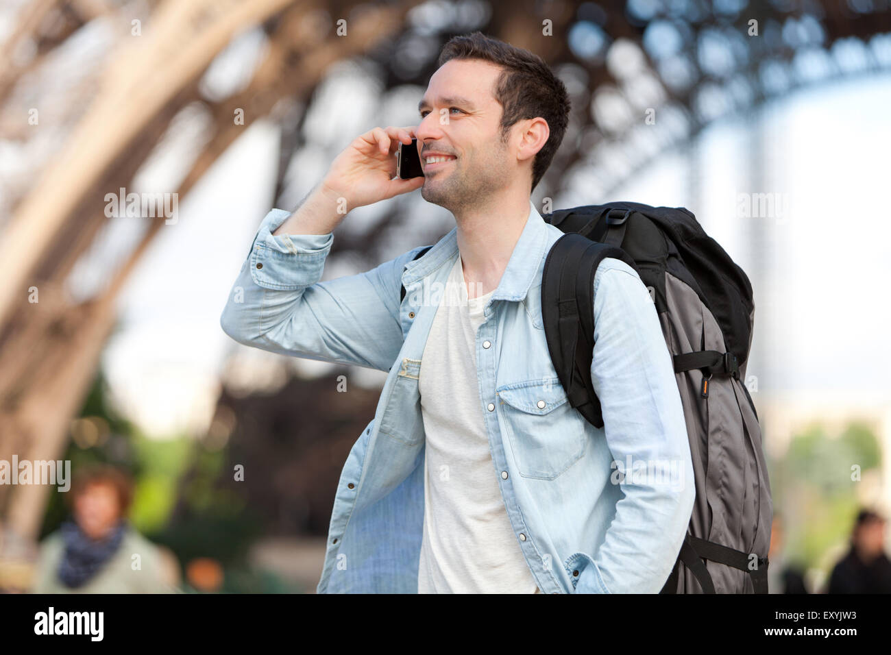 View of a Young attractive tourist phoning in Paris, France Stock Photo Alamy