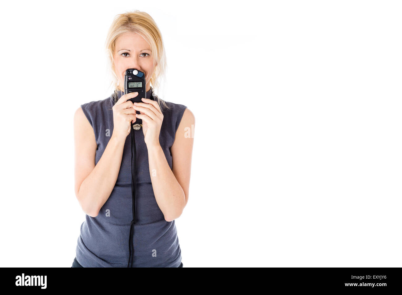 Woman and flash meter Stock Photo