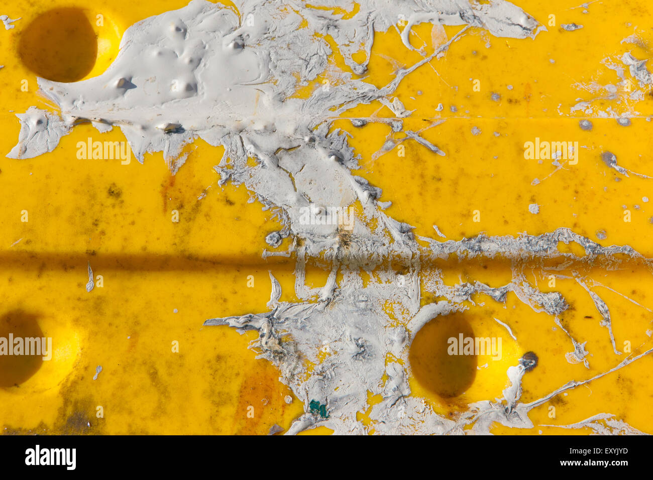 White paint yellow surface round hole abstract Stock Photo