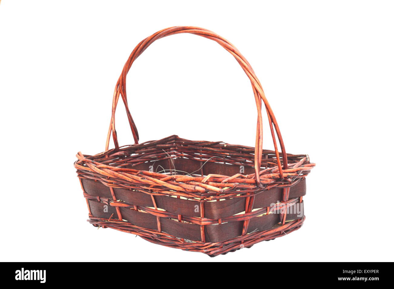 handmade trellis basket for fruits isolated over white background Stock Photo