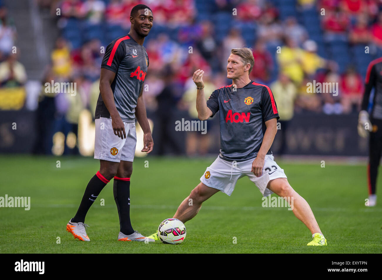 Seattle, USA. 17th July, 2015. Manchester United's Bastian Schweinsteiger and Tyler Blackett stretch before the soccer friendly match between Manchester United and Club America at the Century Link Field in Seattle, USA, 17 July 2015. Photo: Wilson Tsoi/dpa/Alamy Live News Stock Photo