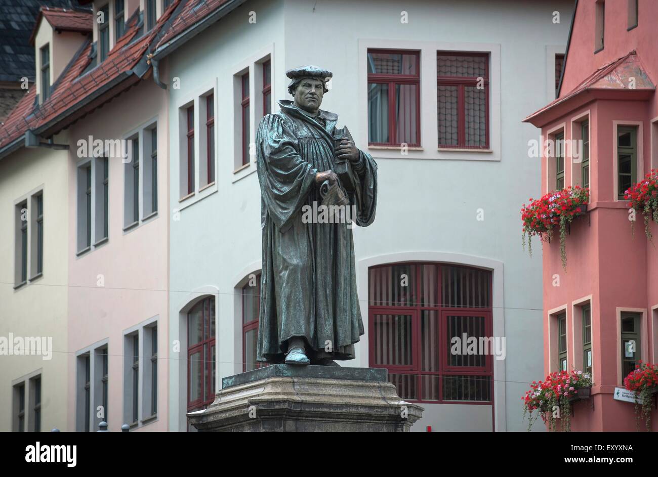 The marketplace in Eisleben where a statue of Martin Luther is placed.Eisleben was Martin Luther's birthplace and where he died Stock Photo