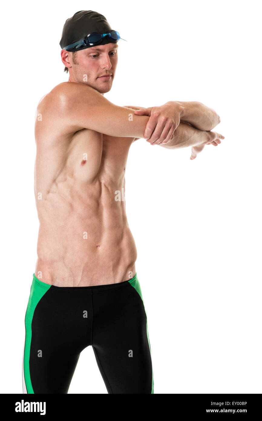 Young adult swimmer. Studio shot over white. Stock Photo