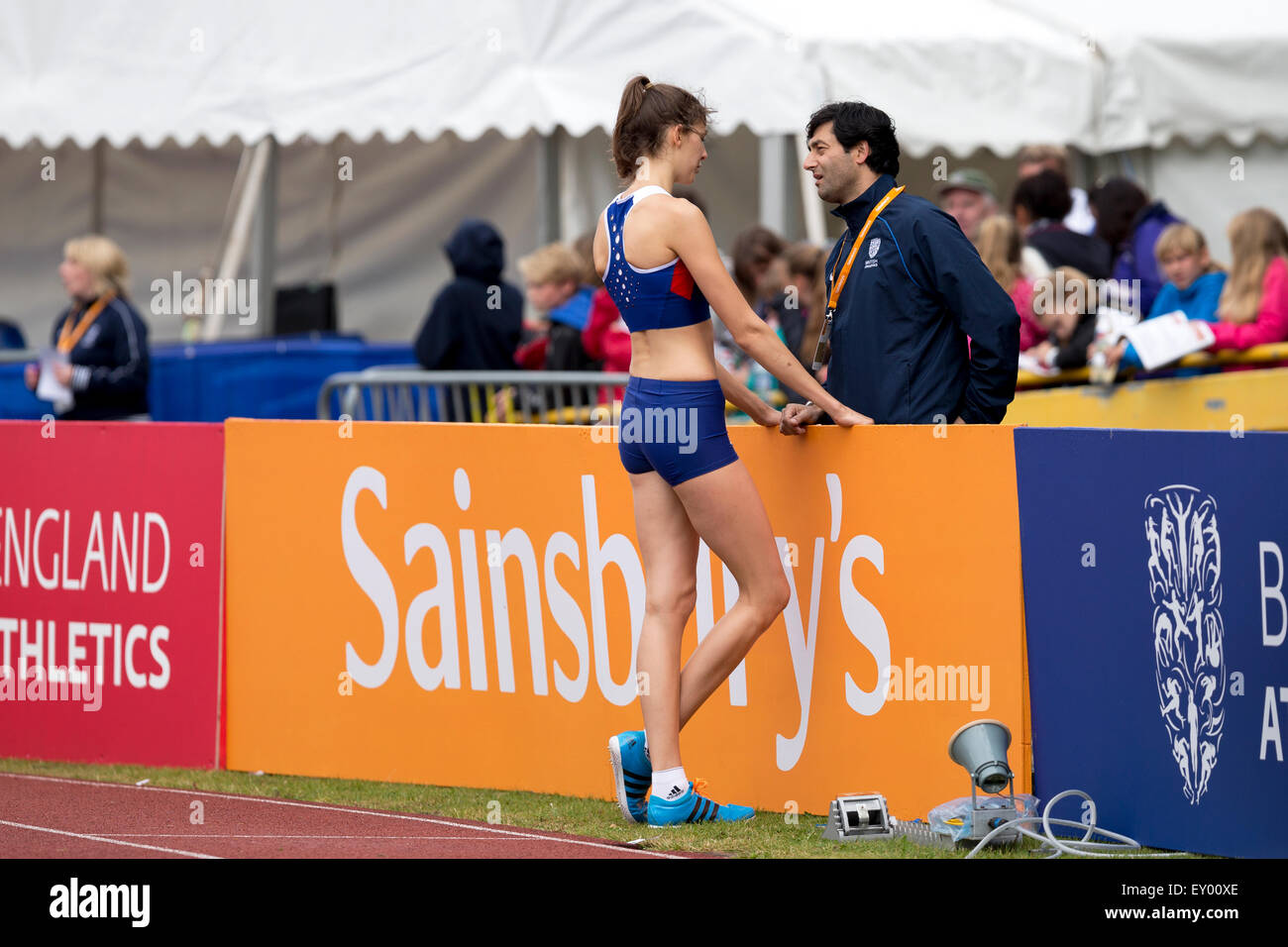 Isobel POOLEY talking to coach Fuzz AHMED Women's High Jump, 2014