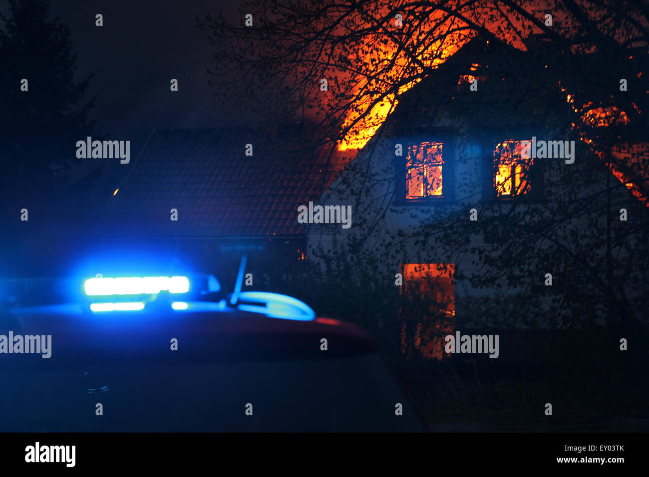 House on fire with rescue car arrived Stock Photo Alamy