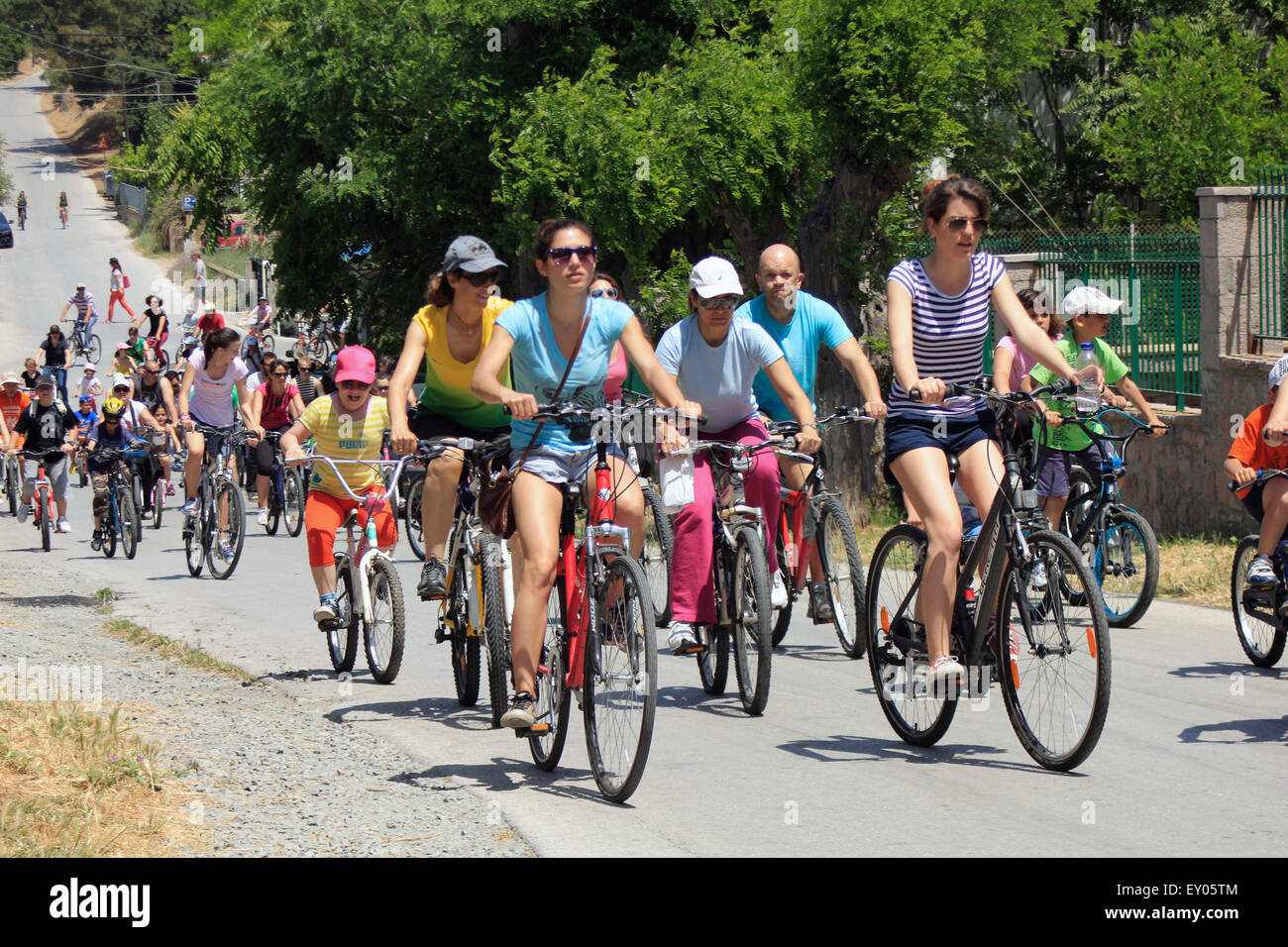 Hundreds of cyclists cycling alongshore Myrina with their bikes. Lemnos or limnos island, Greece Stock Photo