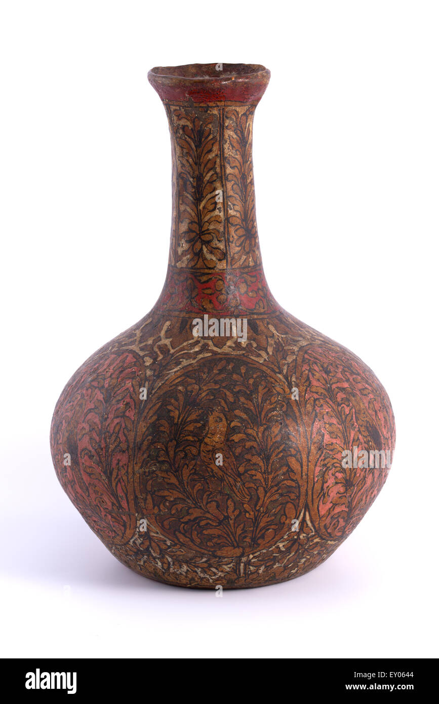 An antique Indo Persian gilt and red lacquer vase, dating from the late 18th to mid 19th century. Stock Photo
