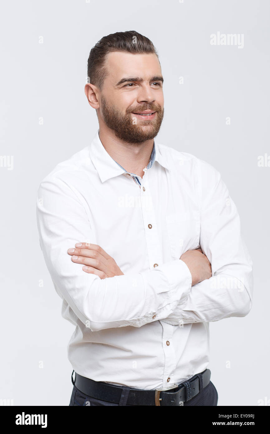 Solid Man Solid man with crossed arms isolated background Stock Photo - Alamy