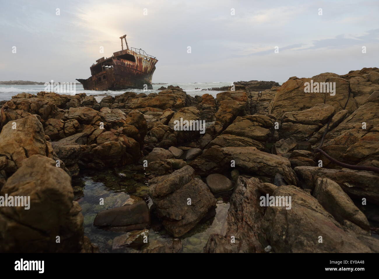 Shipwreck  of the Meisho Maru (a Japanese fishing vessel) off the South African coast close to Cape Agulhas, viewed at sunrise Stock Photo