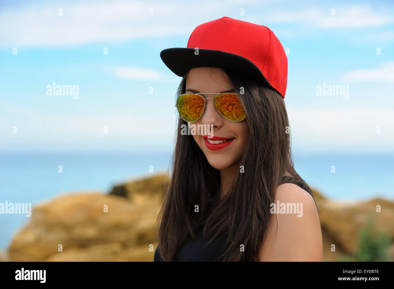 Young Smiling Girl In Red Cap Stock Photo Alamy