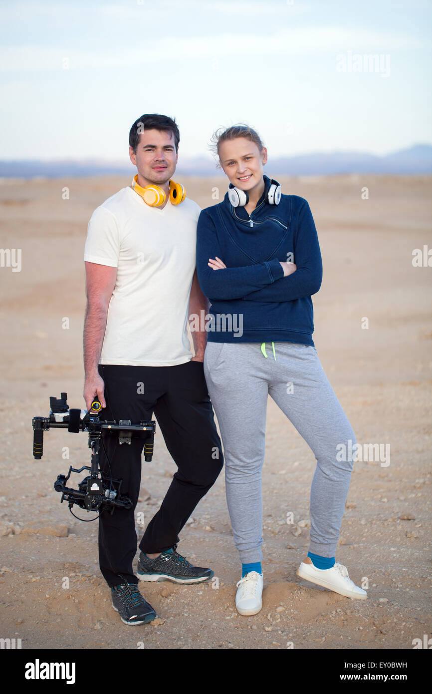 Young people with steadycam on the beach Stock Photo