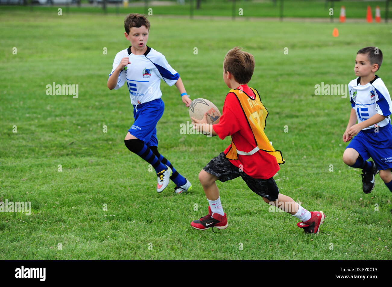 Sports youth rugby played in the USA in Virginia - children 9 10 11 12 girls boys practice together Stock Photo