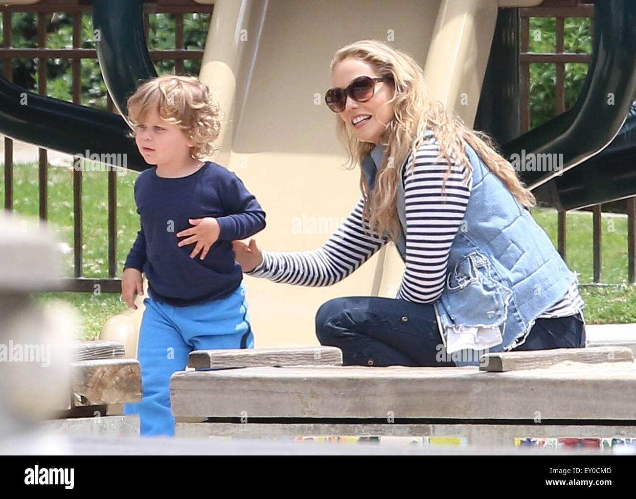 Elizabeth Berkley and husband Greg Lauren take their son Sky to