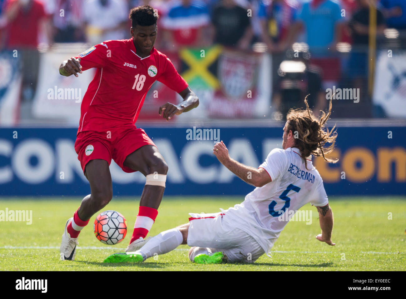 Baltimore, Maryland, USA. 18th July, 2015. #5 USA M Kyle Beckerman makes a slide tackle during the CONCACAF Gold Cup quarterfinal match between USA and Cuba at M&T Bank Stadium in Baltimore, MD. Jacob Kupferman/CSM/Alamy Live News Stock Photo