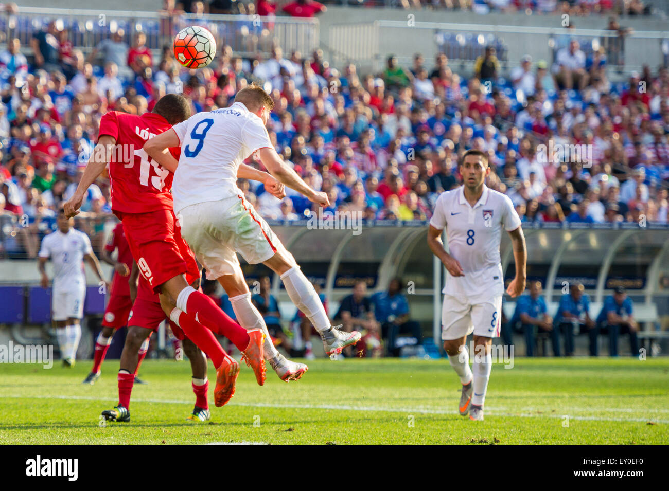 Baltimore, Maryland, USA. 18th July, 2015. #9 USA F Aron Johannsson goes up for a header during the CONCACAF Gold Cup quarterfinal match between USA and Cuba at M&T Bank Stadium in Baltimore, MD. Jacob Kupferman/CSM/Alamy Live News Stock Photo