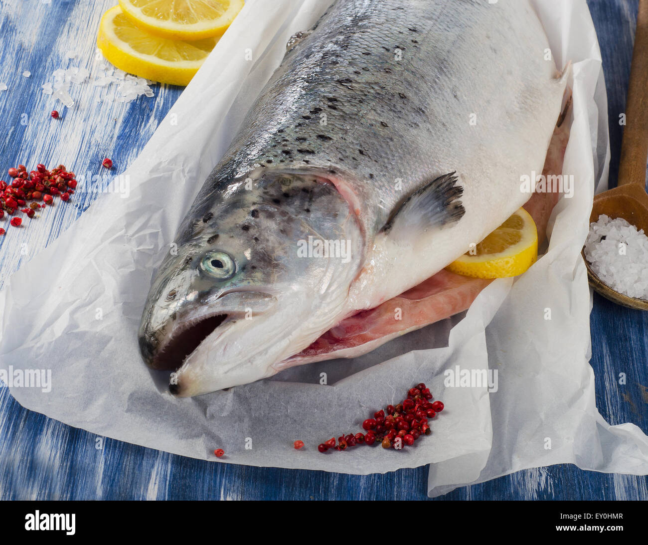 Fresh Salmon with lemon, pepper and salt. Stock Photo