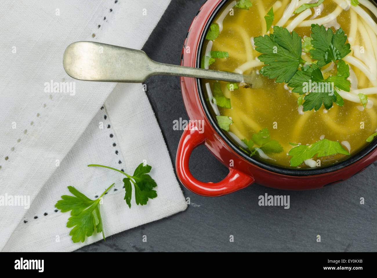 Clear chicken soup with noodles Stock Photo Alamy