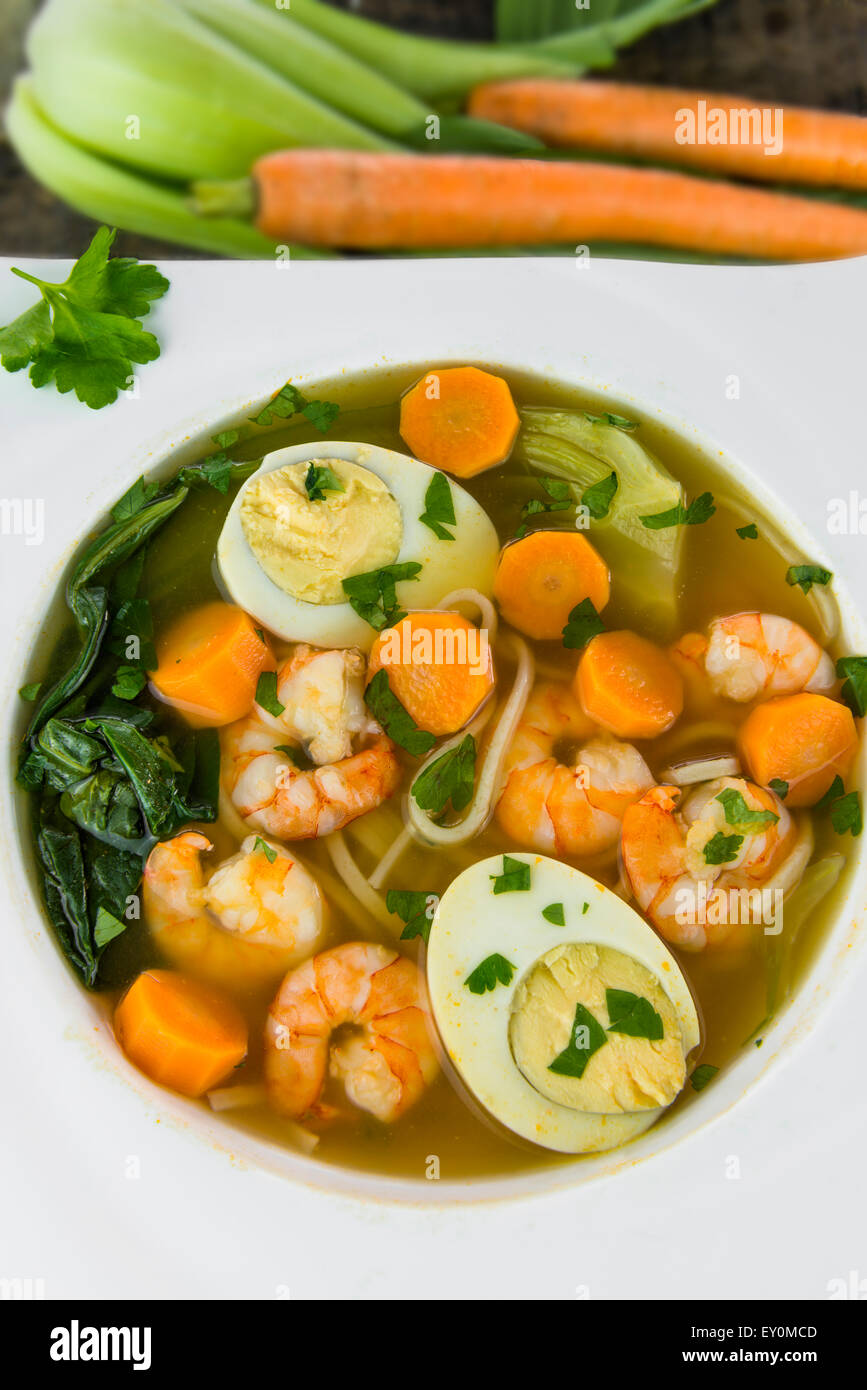 Noodle soup with egg, prawn and pak choi Stock Photo Alamy
