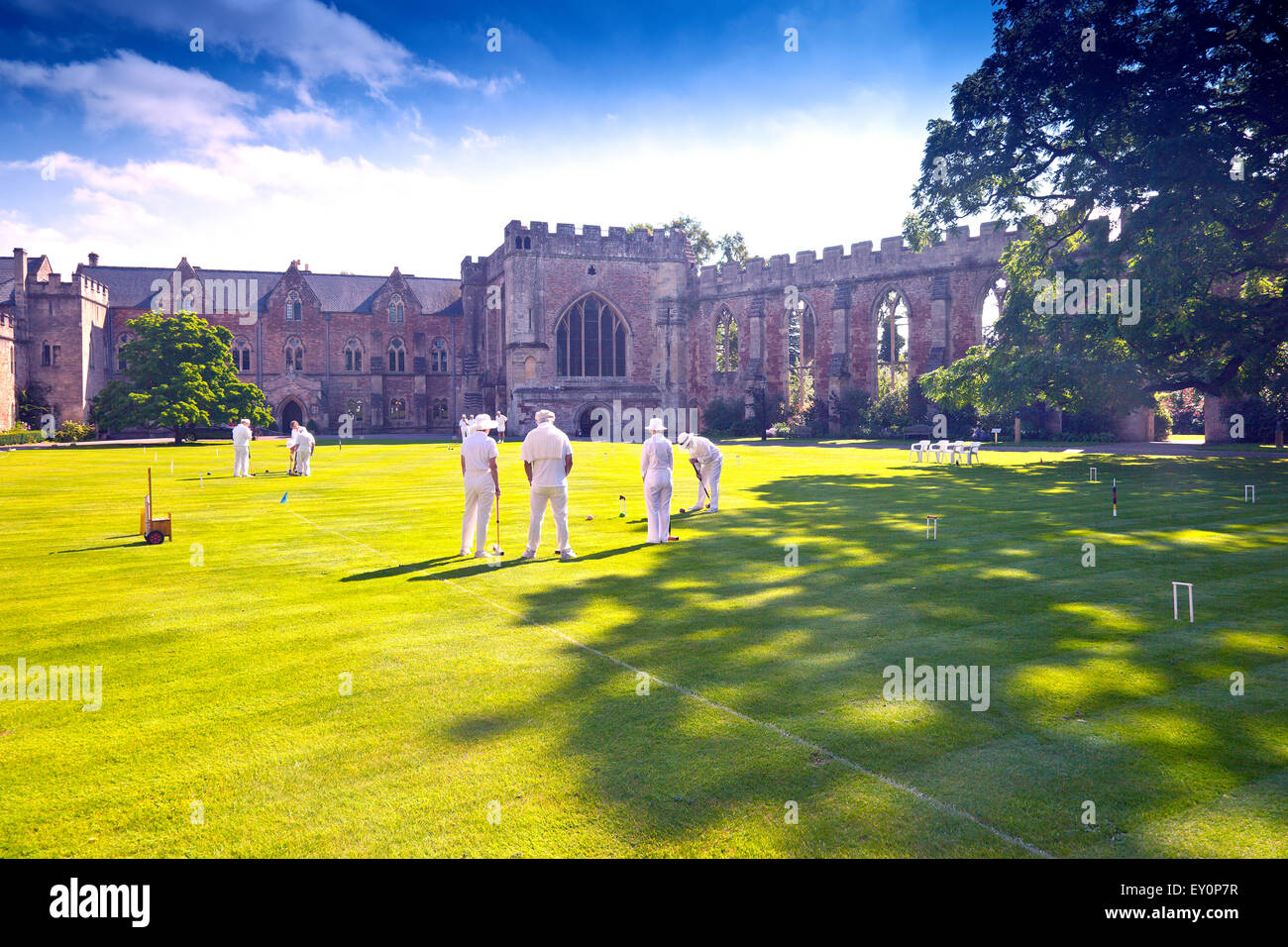 Croquet on the lawn inside the Bishop's Palace in Wells, Somerset, England, UK Stock Photo