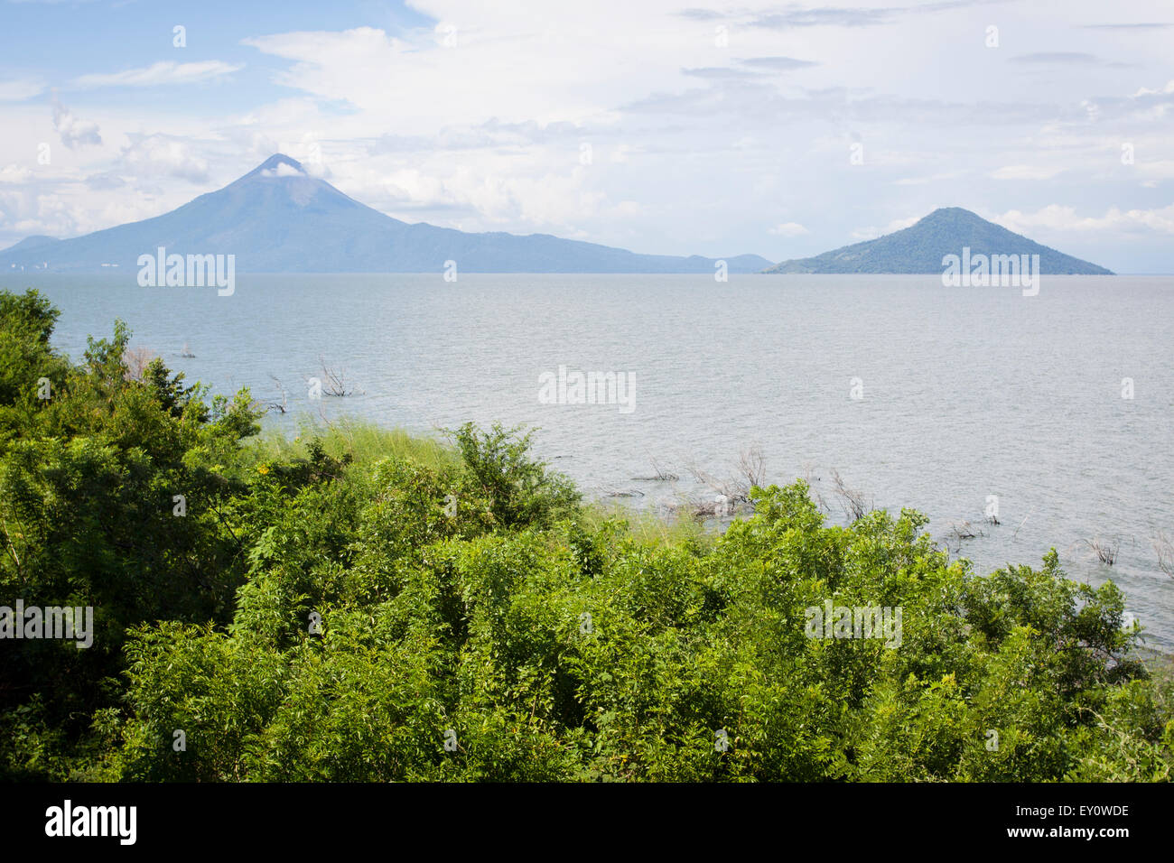Momotombo and Momotombito volcanoes on the Managua lake, Nicaragua Stock Photo