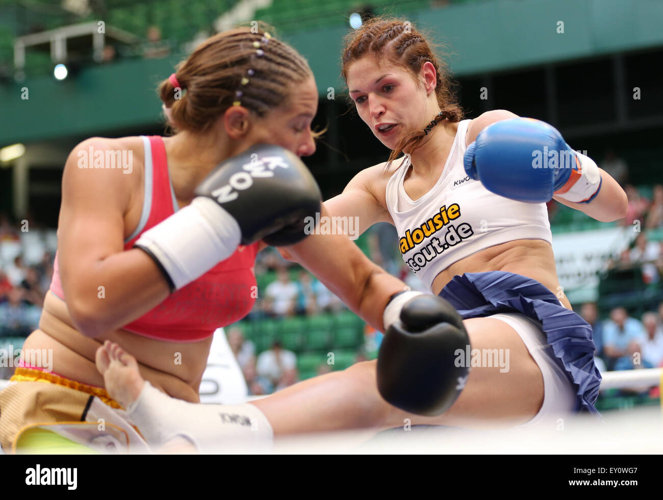 Elite WKU Kickboxing Light Weight: Lomax from the UK vs Lang from Germany battled it out in the Gerry-Weber-Stadion in Halle, Germany, 18 July 2015. Victoria Emma Lomax (l) fights against Marie Lang. Photo: Friso Gentsch/dpa Stock Photo