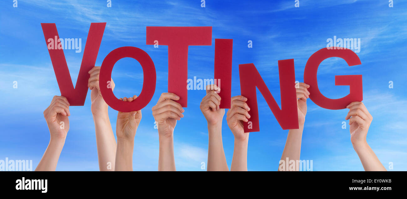 Many People Hands Holding Red Word Voting Blue Sky Stock Photo - Alamy