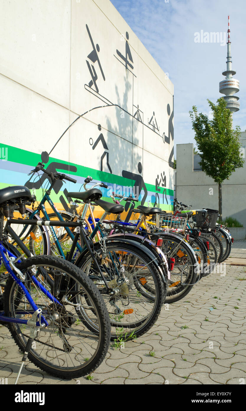 Olympic village Munich, bike in rack communication tower in background Stock Photo
