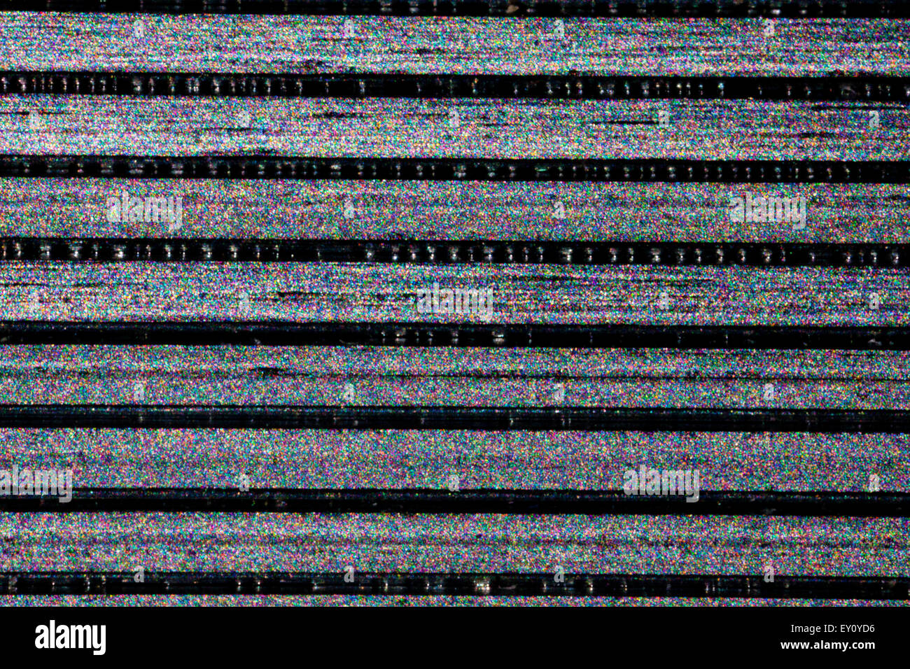 speckles in staples caused by interference of reflected partially coherent sunlight. Context is shown in image EY0YDA Stock Photo