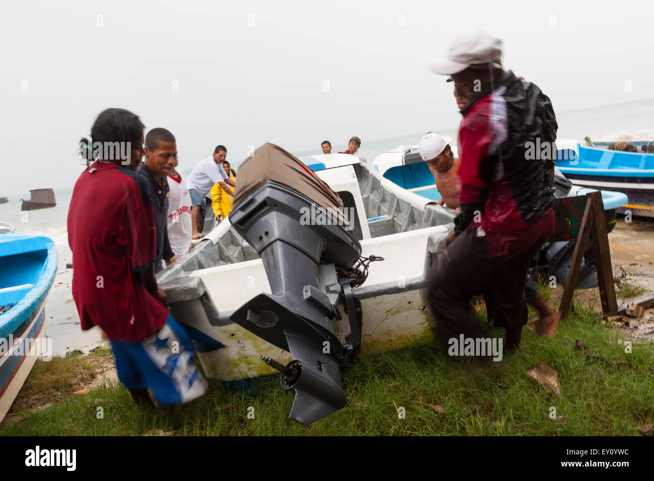Pulling boat out of the water hi-res stock photography and images - Alamy