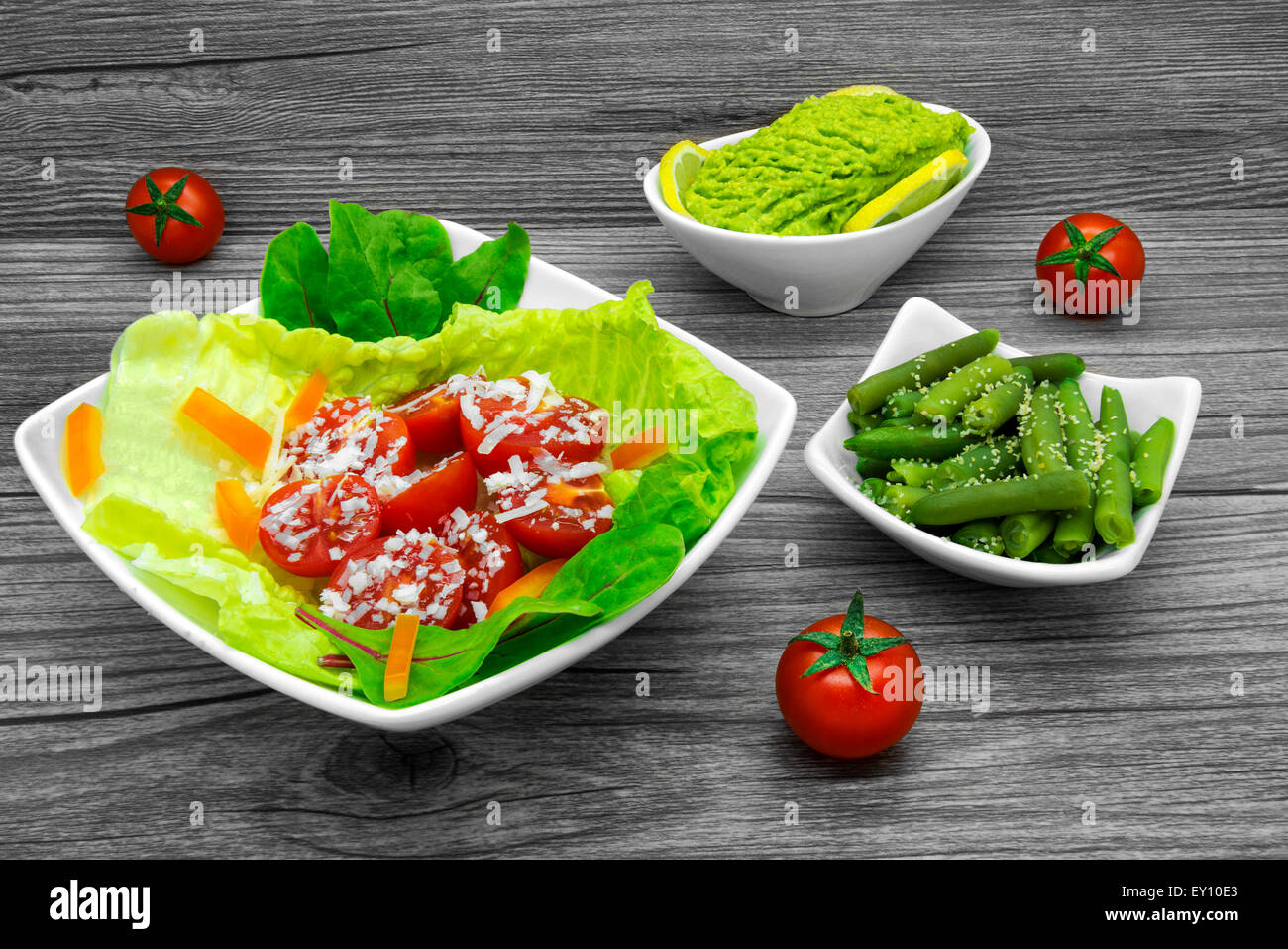 Fresh salad, avocado with lemon and green beans. Stock Photo