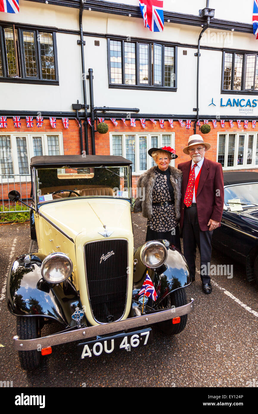proud owners posing with Austin Clifton classic car vehicle antique