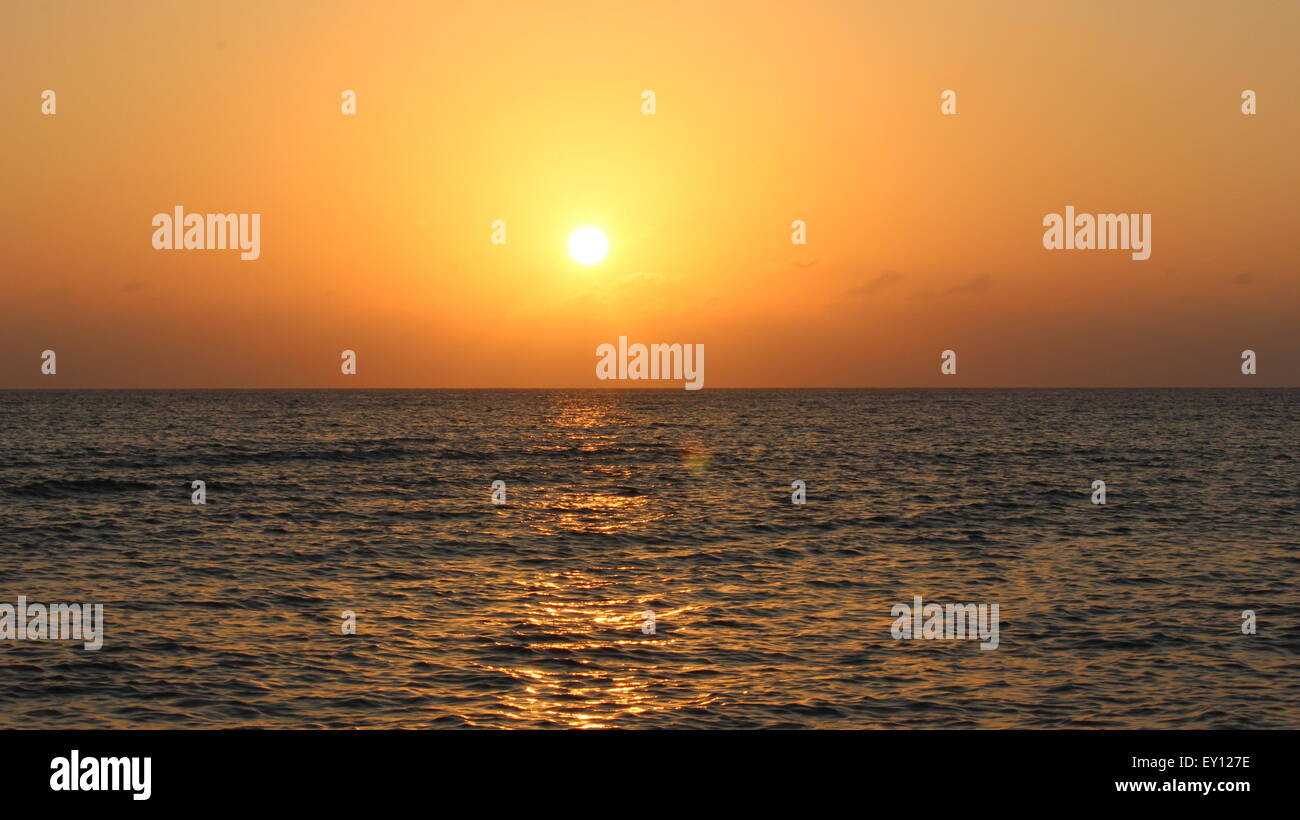 Golden sunset over the Caribbean Sea Stock Photo - Alamy