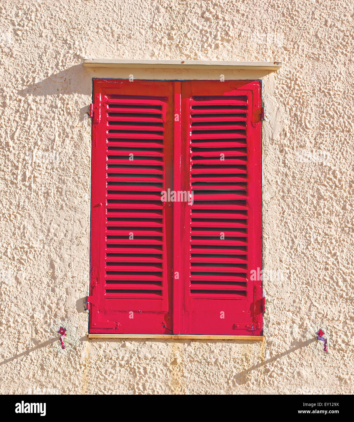 old wooden shutters in an old wall Stock Photo - Alamy