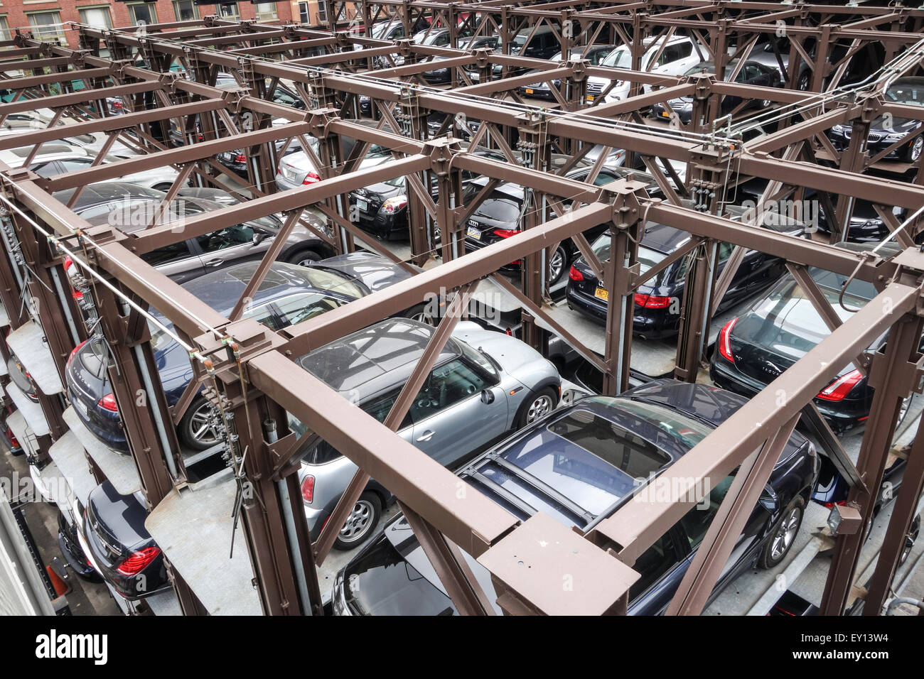 Cars parked vertically, Parking lift, multilevel sysytem, elevator, from above. New York, Manhattan, USA. Stock Photo