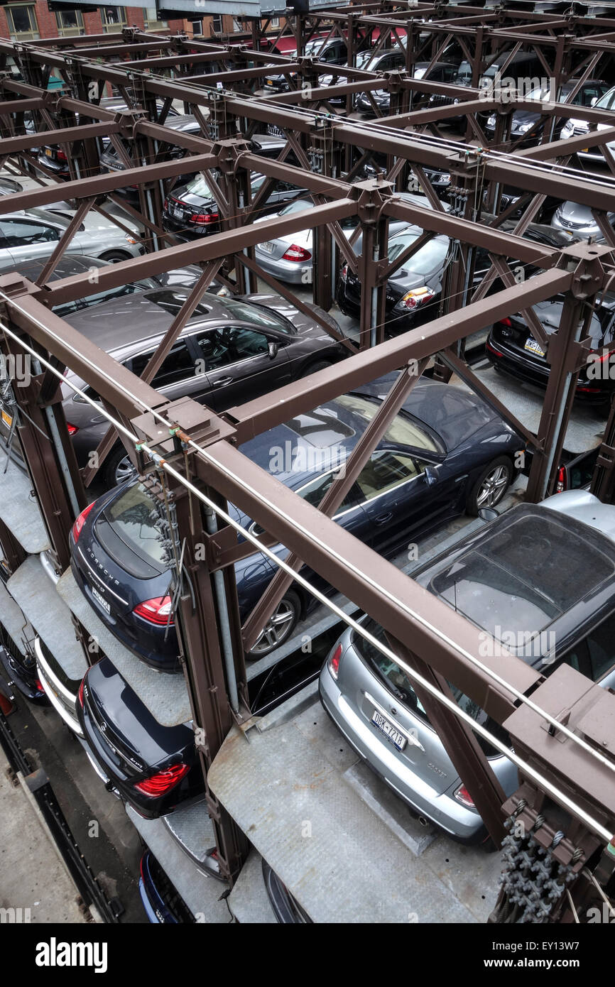 Cars parked vertically, Parking lift, multilevel sysytem, elevator, from above. New York, Manhattan, USA. Stock Photo