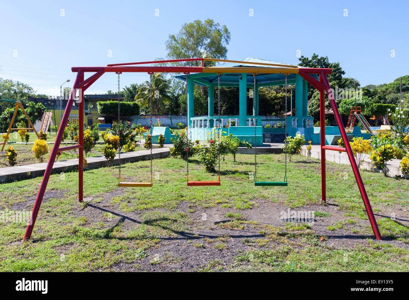 Colorful swing on children's playground in Ometepe Island, Nicaragua Stock Photo