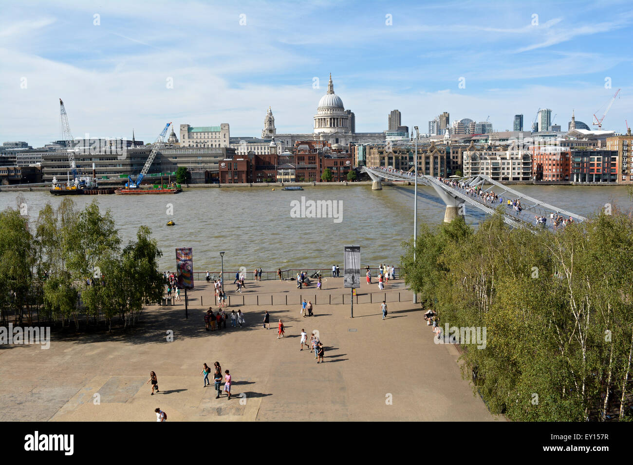View of St Paul's Cathedral, Millennium Bridge, River Thames and city skyline taken from the Tate Modern Stock Photo