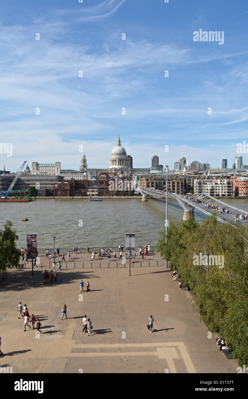 View of St Pauls Cathedral, Millennium Bridge, River Thames and city skyline taken from the Tate Modern Stock Photo